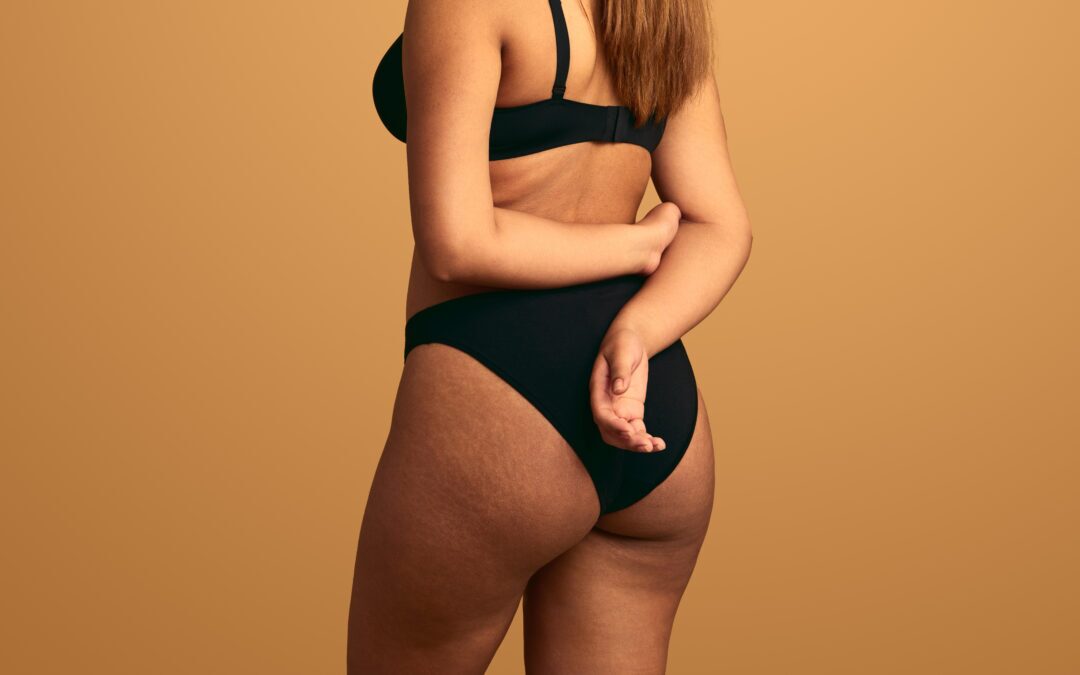Crop shy plus size woman with hands behind back