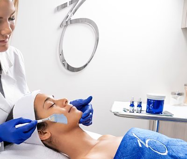 zo skin health patient receiving chemical peel treatment v